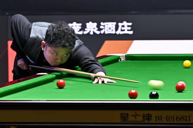 TAIYUAN, CHINA - AUGUST 14: Zhang Anda of China plays a shot in the Quarterfinal match against Stuart Bingham of England on day 7 of the 2026 World Snooker Tour China Open at Taiyuan Binhe Sports Center on August 14, 2026 in Taiyuan, Shanxi Province of China.  Copyright: xChinaxNewsxServicex 111660038357