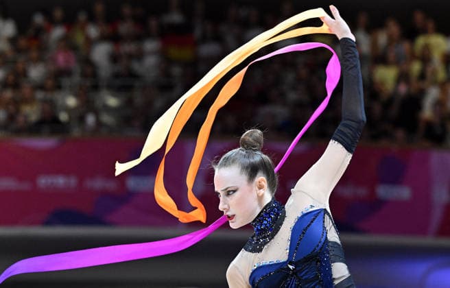14.08.2026, xhbx, Rhythmische Sportgymnastik Weltmeisterschaft 2026, v.l. Darja Varfolomeev (Deutschland) Band Frankfurt am Main *** August 14, 2026, xhbx, 2026 Rhythmic Gymnastics World Championships, from left: Darja Varfolomeev, Germany, ribbon, Frankfurt am Main