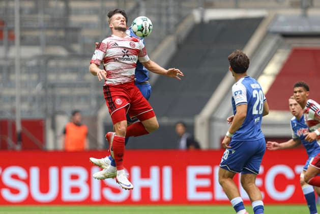 Eric Hottmann (Fortuna Duesseldorf) und Valentin Laessig (TSG Hoffenheim II) im Zweikampf waehrend des Spiels der 3. Liga zwischen Fortuna Duesseldorf und TSG 1899 Hoffenheim II, Merkur Spiel-Arena am 15. August 2026 in Duesseldorf, Deutschland. (Foto von Oliver Kaelke DeFodi Images) +++ Eric Hottmann (Fortuna Duesseldorf) und Valentin Laessig (TSG Hoffenheim II) battle for the ball during the 3. Liga match between Fortuna Duesseldorf and TSG 1899 Hoffenheim II at Merkur Spiel-Arena on August 15, 2026 in Dusseldorf, Germany. (Photo by Oliver Kaelke DeFodi Images) DFB DFL REGULATIONS PROHIBIT ANY USE OF PHOTOGRAPHS AS IMAGE SEQUENCES AND OR QUASI-VIDEO. (Photo by Oliver Kaelke DeFodi Images) - *** Eric Hottmann of Fortuna Düsseldorf and Valentin Laessig of TSG Hoffenheim II battle for the ball during the 3. Liga match between Fortuna Düsseldorf and TSG 1899 Hoffenheim II at the Merkur Spiel Arena on August 15, 2026, in Düsseldorf, Germany. Photo by Oliver Kaelke, DeFodi Images. Eric Hottmann of Fortuna Düsseldorf and Valentin Laessig of TSG Hoffenheim II battle for the ball during the 3. Liga match between Fortuna Düsseldorf and TSG 1899 Hoffenheim II at Merkur Spiel Arena on August 15, 2026 in Düsseldorf, Germany. Photo by Oliver Kaelke, DeFodi Images. DFB and DFL regulations prohibit any use of photographs as image sequences and or quasi-video. Photo by Oliver Kaelke, DeFodi Images.