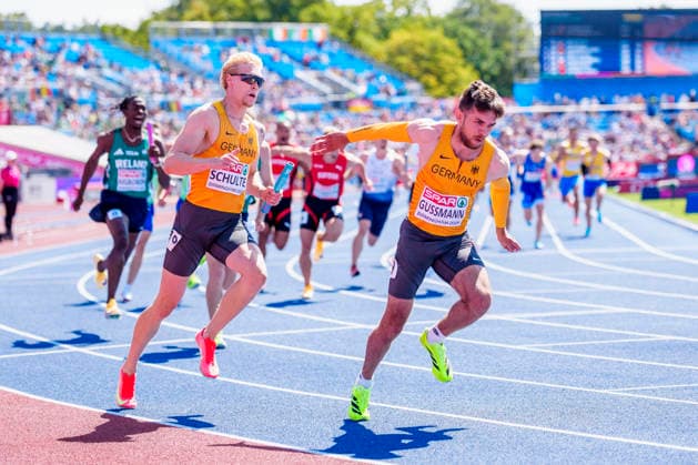 BIRMINGHAM, GREAT BRITAIN - AUGUST 15, 2026 : Marvin SCHULTE (GER Germany) and Heiko GUSSMANN (GER Germany) competing in the 4x100m relay heats during the European Athletics Championships at Alexander Stadium on August 15, 2026 in Birmingham, Great Britain. Great Britain Copyright: xLeahxKohringx