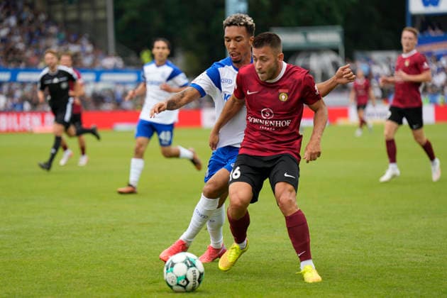 15.08.2026, Hänsch-Arena, Meppen, GER, 3. Liga, 2. Spieltag: SV Meppen vs SG Sonnenhof Großaspach, Marius Kunde (SG Sonnenhof Großaspach 16) vs Oliver Schmitt (SV Meppen 7) DFL REGULATIONS PROHIBIT ANY USE OF PHOTOGRAPHS AS IMAGE SEQUENCES AND OR QUASI-VIDEO. Meppen Niedersachsen Hänsch-Arena *** August 15, 2026, Hänsch Arena, Meppen, GER, 3rd Division, Matchday 2: SV Meppen vs. SG Sonnenhof Großaspach, Marius Kunde (SG Sonnenhof Großaspach 16) vs. Oliver Schmitt (SV Meppen 7) DFL REGULATIONS PROHIBIT ANY USE OF PHOTOGRAPHS AS IMAGE SEQUENCES AND OR QUASI-VIDEO Meppen, Lower Saxony, Hänsch Arena