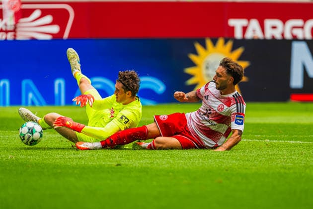 Lukas Petersson (TSG Hoffenheim II, 01) mit einer Rettungsaktion gegen den graetschenden Fabian Schleusener (Fortuna Düsseldorf, 24) Fortuna Duesseldorf vs. TSG Hoffenheim II, Fussball, 3.Liga, 02.Spieltag, Saison 2026 27, 15.08.2026, DFL REGULATIONS PROHIBIT ANY USE OF PHOTOGRAPHS AS IMAGE SEQUENCES AND OR QUASI-VIDEO, Fortuna Duesseldorf vs. TSG Hoffenheim II, Fussball, 3.Liga, 2.Spieltag, Saison 2026 27, 15.08.2026 Düsseldorf *** Lukas Petersson (TSG Hoffenheim II), No. 01, makes a save against Fabian Schleusener (Fortuna Düsseldorf), No. 24, as he slides in; Fortuna Düsseldorf vs. TSG Hoffenheim II, soccer, 3. Liga, Matchday 02, 2026–27 season, August 15, 2026, DFL regulations prohibit any use of photographs as image sequences and or quasi-video, Fortuna Düsseldorf vs. TSG Hoffenheim II, soccer, 3. Liga, Matchday 2, 2026–27 Season, August 15, 2026, Düsseldorf Copyright: xEibner-Pressefoto LukasxBaldygax EP_LBA