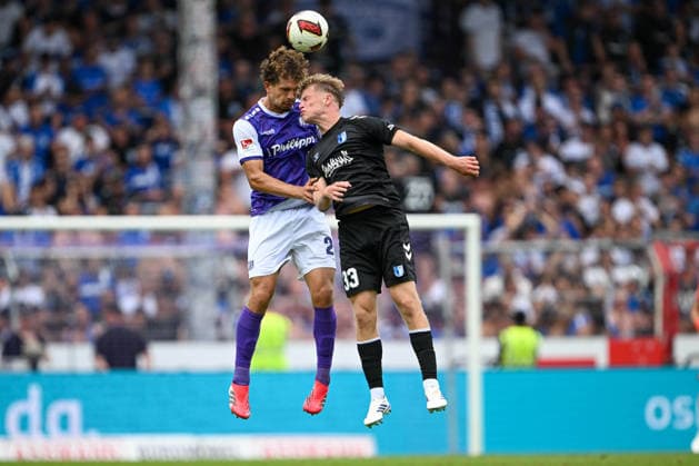 2. Bundesliga 26 27 - VfL Osnabrück - 1. FC Magdeburg am 15.08.2026 an der Bremer Brücke in Osnabrück Robin Fabinski (Osnabrueck) im Zweikampf gegen Leon Mergner (Magdeburg) *** 2. Bundesliga, Matchday 26, VfL Osnabrück 1, FC Magdeburg on August 15, 2026, at Bremer Brücke in Osnabrück; Robin Fabinski (Osnabrück) in a tackle against Leon Mergner (Magdeburg) MT