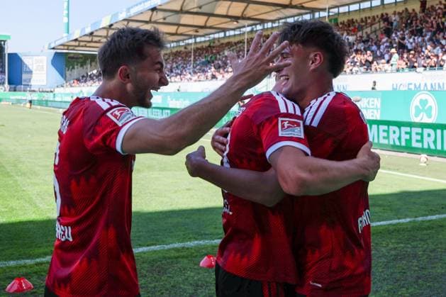 Adam Markhiyev 6 (1FC Nuernberg), Piet Scobel 19 (1 FC Nuernberg) und Javier Fernandez 8 (1FC Nuernberg) jubeln ueber das Tor zum 2:4, SpVgg Greuther Fuerth vs. 1. FC Nuernberg, Fussball, Maenner, 2. Bundesliga, Saison 2026 2027, Hinrunde, 2. Spieltag, 15.08.2026 DFB regulations prohibit any use of photographs as image sequences and or quasi-video Fuerth Bayern Deutschland *** Adam Markhiyev 6 (1. FC Nuremberg), Piet Scobel 19 (1. FC Nuremberg), and Javier Fernandez 8 (1. FC Nuremberg) celebrate the goal that made the score 2–4, SpVgg Greuther Fürth vs. 1. FC Nuremberg, soccer, Men, 2. Bundesliga, 2026–2027 season, first half of the season, Matchday 2, August 15, 2026. DFB regulations prohibit any use of photographs as image sequences and or quasi-video. Fürth, Bavaria, Germany Copyright: xkolbert-press MartinxAgüerax
