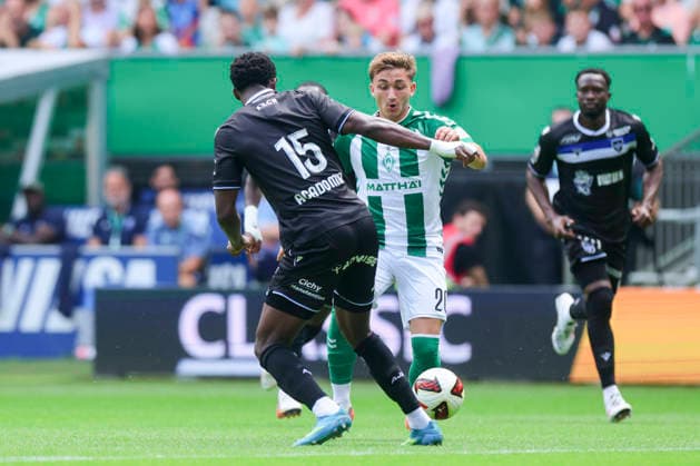 Christ Makosso (AJ Auxerre) und Ivan San Jose Cantalejo Chuki (Werder Bremen) kaempfen um den Ball waehrend des Freundschaftsspiels zwischen Werder Bremen und AJ Auxerre im Weserstadion am 15. August 2026 in Bremen, Deutschland. (Foto von Marco Steinbrenner DeFodi Images) +++ Christ Makosso (AJ Auxerre) und Ivan San Jose Cantalejo Chuki (Werder Bremen) battle for the ball during the Friendly match between Werder Bremen and AJ Auxerre at Weserstadion on August 15, 2026 in Bremen, Germany. (Photo by Marco Steinbrenner DeFodi Images) (Photo by Marco Steinbrenner DeFodi Images) - *** Christ Makosso of AJ Auxerre and Ivan San Jose Cantalejo Chuki of Werder Bremen battle for the ball during the friendly match between Werder Bremen and AJ Auxerre at the Weserstadion on August 15, 2026, in Bremen, Germany. Photo by Marco Steinbrenner, DeFodi Images. Christ Makosso of AJ Auxerre and Ivan San Jose Cantalejo Chuki of Werder Bremen battle for the ball during the friendly match between Werder Bremen and AJ Auxerre at the Weserstadion on August 15, 2026 in Bremen, Germany Photo by Marco Steinbrenner DeFodi Images Photo by Marco Steinbrenner DeFodi Images