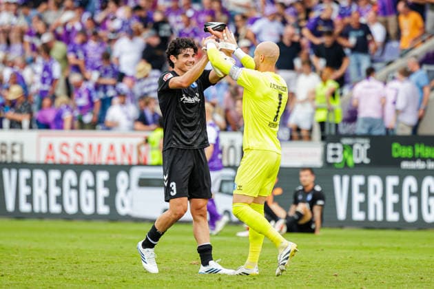 (L-R) Anselmo Garcia Mac-Nulty (1. FC Magdeburg, 03), Dominik Reimann (1. FC Magdeburg, 01) jubeln nach Spielende ueber den 0:3 Sieg GER, VfL Osnabrueck vs. 1. FC Magdeburg, Fussball, 2. Bundesliga, 2. Spieltag, Spielzeit 2026 2027, 15.08.2026 DFL Regulations prohibit any use of photographers as image sequences and or quasi-video. GER, VfL Osnabrueck vs. 1. FC Magdeburg, Fussball, 2. Bundesliga, 2. Spieltag, Spielzeit 2026 2027, 15.08.2026 Osnabrueck *** L R Anselmo Garcia Mac Nulty (1, FC Magdeburg, 03) and Dominik Reimann (1, FC Magdeburg, 01) celebrate their 0-3 victory after the final whistle, GER, VfL Osnabrück vs. 1 FC Magdeburg, Soccer, 2. Bundesliga, Matchday 2, 2026–2027 season, August 15, 2026 DFL regulations prohibit any use of photographs as image sequences and or quasi-video GER, VfL Osnabrück vs. 1. FC Magdeburg, soccer, 2. Bundesliga, Matchday 2, 2026–2027 season, August 15, 2026 Osnabrück Copyright: xEibner-Pressefoto JanxRollingerx EP_JSK