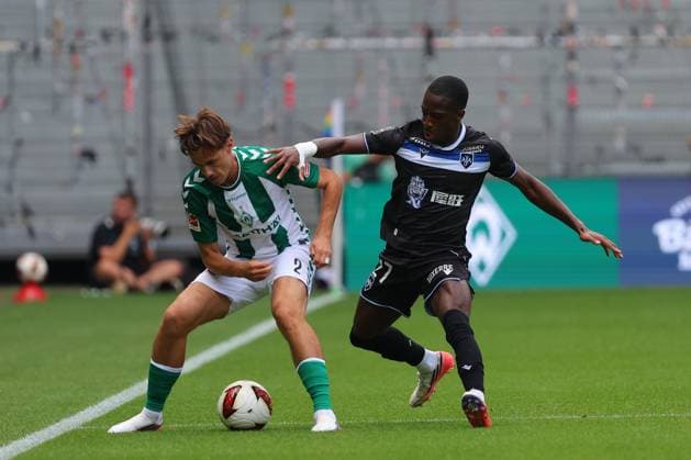 15.08.26, GER, Fussball, 1.FBL Männer, Freundschaftsspiel, Tach der Fans 2026, Saison2026 2027, Weserstadion, SV Werder Bremen vs.AJ Auxerre Olivier Deman (SV Werder Bremen 02) im Zweikampf gegen Lamine Sy (AJ Auxerre 27) Foto nordphoto GmbH Tauchnitz DFB REGULATIONS PROHIBIT ANY USE OF PHOTOGRAPHS AS IMAGE SEQUENCES AND OR QUASI-VIDEO. Bremen Weserstadion Bremen Germany *** August 26, 2015, GER, Soccer, 1st Bundesliga Men, Friendly Match, Fan Day 2026, 2026–2027 Season, Weserstadion, SV Werder Bremen vs. AJ Auxerre Olivier Deman of SV Werder Bremen 02 in a tackle against Lamine Sy of AJ Auxerre 27 Photo: nordphoto GmbH Tauchnitz DFB REGULATIONS PROHIBIT ANY USE OF PHOTOGRAPHS AS IMAGE SEQUENCES AND OR QUASI-VIDEO Bremen Weserstadion, Bremen, Germany Copyright: xnordphotoxGmbHx xTauchnitzx