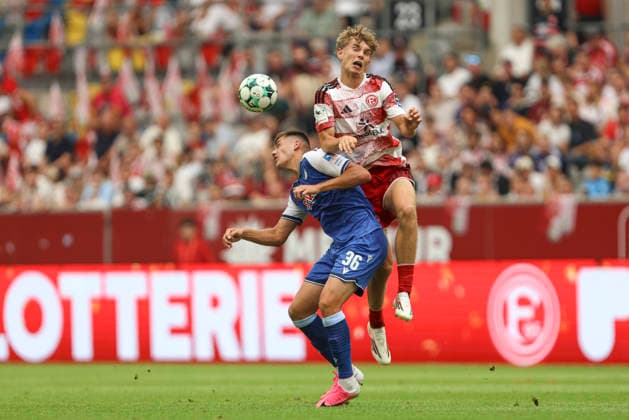 Jakov Dedic (TSG Hoffenheim II) und Elias Arden (Fortuna Duesseldorf) im Zweikampf waehrend des Spiels der 3. Liga zwischen Fortuna Duesseldorf und TSG 1899 Hoffenheim II, Merkur Spiel-Arena am 15. August 2026 in Duesseldorf, Deutschland. (Foto von Oliver Kaelke DeFodi Images) +++ Jakov Dedic (TSG Hoffenheim II) und Elias Arden (Fortuna Duesseldorf) battle for the ball during the 3. Liga match between Fortuna Duesseldorf and TSG 1899 Hoffenheim II at Merkur Spiel-Arena on August 15, 2026 in Dusseldorf, Germany. (Photo by Oliver Kaelke DeFodi Images) DFB DFL REGULATIONS PROHIBIT ANY USE OF PHOTOGRAPHS AS IMAGE SEQUENCES AND OR QUASI-VIDEO. (Photo by Oliver Kaelke DeFodi Images) - *** Jakov Dedic of TSG Hoffenheim II and Elias Arden of Fortuna Düsseldorf battle for the ball during the 3. Liga match between Fortuna Düsseldorf and TSG 1899 Hoffenheim II at the Merkur Spiel Arena on August 15, 2026, in Düsseldorf, Germany. Photo by Oliver Kaelke, DeFodi Images. Jakov Dedic of TSG Hoffenheim II and Elias Arden of Fortuna Düsseldorf battle for the ball during the 3. Liga match between Fortuna Düsseldorf and TSG 1899 Hoffenheim II at Merkur Spiel Arena on August 15, 2026 in Düsseldorf, Germany. Photo by Oliver Kaelke, DeFodi Images. DFB and DFL regulations prohibit any use of photographs as image sequences and or quasi-video. Photo by Oliver Kaelke, DeFodi Images.