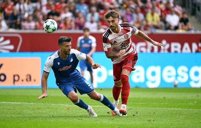 Düsseldorf, Germany, 3. Liga, Matchday 2, Merkur-Spiel-Arena Düsseldorf, Fortuna Düsseldorf vs TSG Hoffenheim II; Fabian Schleusener (F95), Klaus Gjasula (HOF). Action *** Düsseldorf, Germany, 3. Liga, Matchday 2, Merkur Spiel Arena Düsseldorf, Fortuna Düsseldorf vs. TSG Hoffenheim II Fabian Schleusener F95, Klaus Gjasula HOF Action