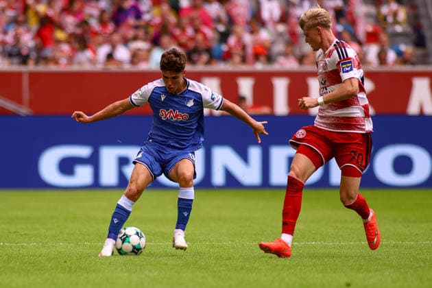 15.08.2026, GER, Fussball, Herren, 3. Liga , Saison 2026 2027, Fortuna Düsseldorf - TSG Hoffenheim II Matthew Moore (TSG II) und Felix Meiser (F95) im Kampf um den Ball *** August 15, 2026, GER, Soccer, Men s, 3rd Division, 2026–2027 Season, Fortuna Düsseldorf vs. TSG Hoffenheim II: Matthew Moore (TSG II) and Felix Meiser (F95) battle for the ball Copyright: xSvenxHanischx