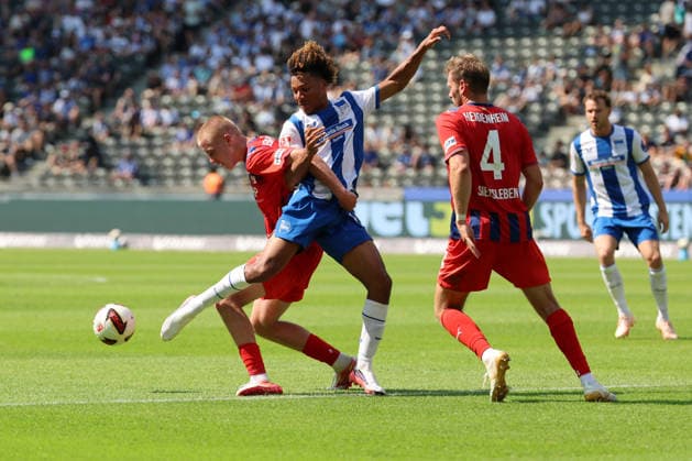BERLIN, DEUTSCHLAND - AUGUST 15: Marko Zrilic (Heidenheim, 41) in the duel for the ball with Oluwaseun Adewumi (Hertha BSC 19), during the match in the 2. German Bundesliga: Hertha BSC - 1. FC Heidenheim at Olympiastadion Berlin on matchday 29 on August 15, 2026 in Berlin, Deutschland. DFB regulations prohibit any use of photographs as image sequences and or quasi video. Berlin Deutschland Copyright: xO.Frankex