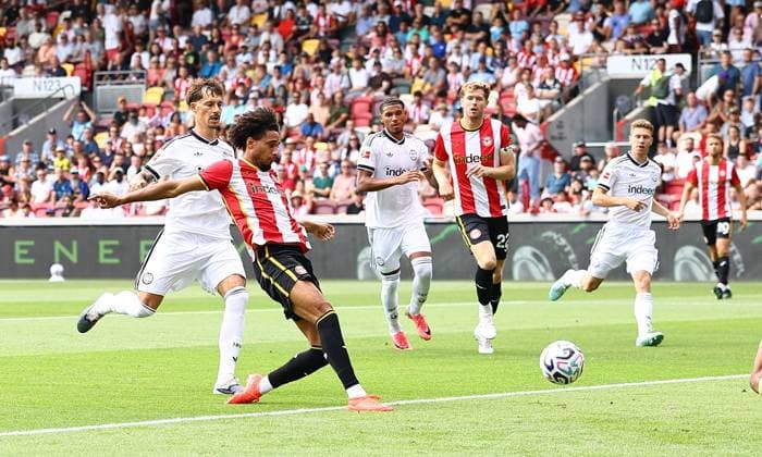 Kevin Schade of Brentford scores the opening goal Brentford v Eintracht Frankfurt, Pre Season Friendly, Football, Gtech Community Stadium, London, UK - 15 Aug 2026London Gtech Community Stadium United Kingdom EDITORIAL USE ONLY No use with unauthorised audio, video, data, fixture lists, club league logos or live services. Online in-match use limited to 120 images, no video emulation. No use in betting, games or single club league player publications.  Copyright: xMichaelxZemanek Shutterstockx 17070130b