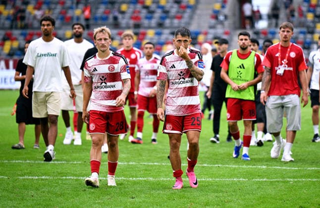 Düsseldorf, Germany, 3. Liga, Matchday 2, Merkur-Spiel-Arena Düsseldorf, Fortuna Düsseldorf vs TSG Hoffenheim II 0:2; Matthias Zimmermann (F95) and Sascha Risch (F95) after the match. Disappointment, Frustration, Action. *** Düsseldorf, Germany, 3rd Division, Matchday 2, Merkur Spiel Arena Düsseldorf, Fortuna Düsseldorf vs. TSG Hoffenheim II 0–2 Matthias Zimmermann F95 and Sascha Risch F95 after the match: Disappointment, Frustration, Action