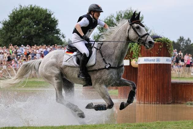Malin Hansen-Hotopp (GER, Deutschland, Germany) mit Pferd Carlitos Quidditch K , Vielseitigkeit Geländeritt, FEI Eventing World Championship, WM, Weltmeisterschaft , DHL-Preis, Einzel Mannschaft, Geländeprüfung, Gelände, Cross Country , AACHEN - FEI World Championships 2026, Weltfest des Pferdesports, Reitsport Weltmeisterschaft 2026, Aachen 2026, Welcome Home 2026, Aachener Soers, 11. bis 23. August 2026, Reitsport, 15.08.2026, Aachen Aachener Soers Deutschland *** Malin Hansen Hotopp GER, Germany, with her horse Carlitos Quidditch K, Eventing Cross-Country, FEI Eventing World Championship, DHL Prize, Individual and Team, Cross-Country Test, Cross-Country, AACHEN FEI World Championships 2026, World Equestrian Festival, 2026 World Equestrian Championships, Aachen 2026, Welcome Home 2026, Aachen Soers, August 11–23, 2026, Equestrian Sports, August 15, 2026, Aachen Soers, Germany