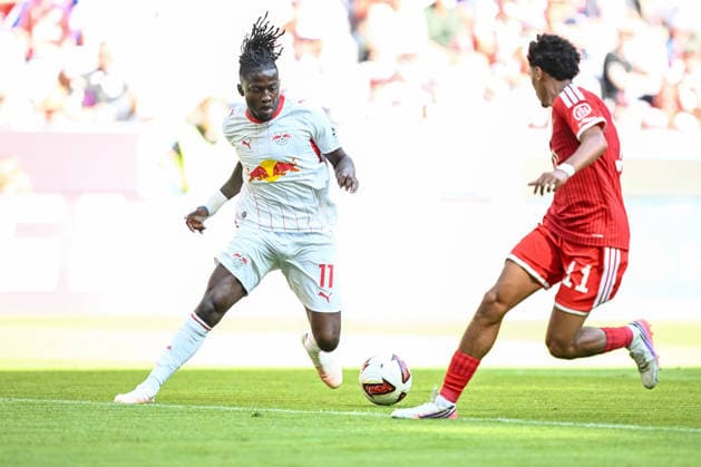 Johan Bakayoko (RB Leipzig) and Nathaniel Brown (FC Bayern Muenchen) battle for the ball during the Telekom Cup match between FC Bayern Muenchen and RB Leipzig at Allianz Arena on August 15, 2026 in Munich, Germany. (Photo by Harry Langer DeFodi Images) - *** Johan Bakayoko of RB Leipzig and Nathaniel Brown of FC Bayern Munich battle for the ball during the Telekom Cup match between FC Bayern Munich and RB Leipzig at the Allianz Arena on August 15, 2026, in Munich, Germany. Photo by Harry Langer, DeFodi Images