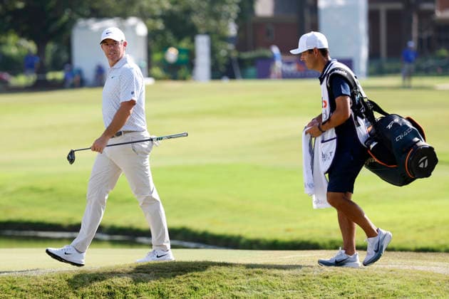 MEMPHIS, TN - AUGUST 15: Rory Mcllroy of Northern Ireland and his caddie Harry Diamond walk onto the No. 11 green during the third round of the FedEx St. Jude Championship, August 15, 2026, at TPC Southwind in Memphis, Tennessee. (Photo by Matthew Maxey Icon Sportswire) GOLF: AUG 15 PGA, Golf Herren FedEx St. Jude Championship EDITORIAL USE ONLY Icon260815005