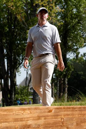 MEMPHIS, TN - AUGUST 15: Rory Mcllroy of Northern Ireland walks across a bridge on No. 11 during the third round of the FedEx St. Jude Championship, August 15, 2026, at TPC Southwind in Memphis, Tennessee. (Photo by Matthew Maxey Icon Sportswire) GOLF: AUG 15 PGA, Golf Herren FedEx St. Jude Championship EDITORIAL USE ONLY Icon260815008