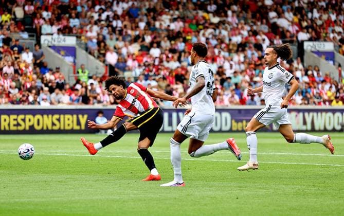 Kevin Schade of Brentford scores their seventh fourth goal Brentford v Eintracht Frankfurt, Pre Season Friendly, Football, Gtech Community Stadium, London, UK - 15 Aug 2026London Gtech Community Stadium United Kingdom EDITORIAL USE ONLY No use with unauthorised audio, video, data, fixture lists, club league logos or live services. Online in-match use limited to 120 images, no video emulation. No use in betting, games or single club league player publications.  Copyright: xMichaelxZemanek Shutterstockx 17070130ap