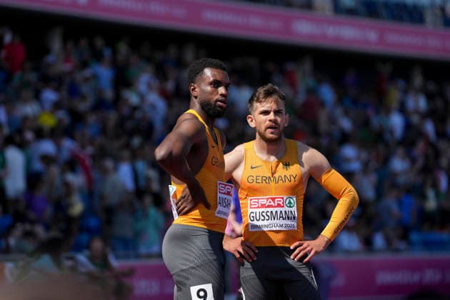 ATHLETICS - European Athletics Championships BIRMINGHAM,ENGLAND,15.AUG.26 - ATHLETICS - European Athletics Championships, 4x100m, relay, Men. Image shows Lucas Ansah-Peprah and Heiko Gussmann (GER).  GEPAxpictures xRanjithxKumar