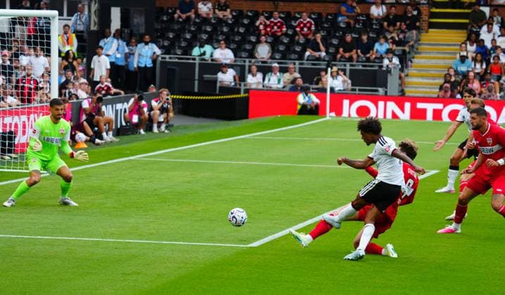 Oscar Bobb of Fulham has a shot saved Fulham v Stuttgart, Pre Season Friendly, Football, Craven Cottage, London, UK - 15 Aug 2026London Craven Cottage United Kingdom EDITORIAL USE ONLY No use with unauthorised audio, video, data, fixture lists, club league logos or live services. Online in-match use limited to 120 images, no video emulation. No use in betting, games or single club league player publications.  Copyright: xJavierxGarcia Shutterstockx 17070137al