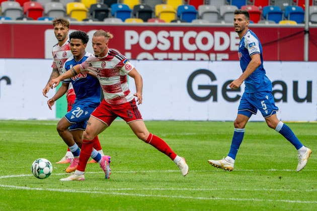 15.08.2026, xkkux, Fußball, Fortuna Düsseldorf - TSG 1899 Hoffenheim II, 3.Liga, MERKUR SPIEL-ARENA, 2. Spieltag, Saison 2026 2027: Jorrit Hendrix (Fortuna Düsseldorf 08) im Zweikampf gegen Tiago Poller (TSG Hoffenheim II 20) DFB regulations prohibit any use of photographs as image sequences and or quasi-video. Nordrhein-Westfalen Deutschland *** August 15, 2026, xkkux, Soccer, Fortuna Düsseldorf vs. TSG 1899 Hoffenheim II, 3. Liga, MERKUR SPIEL ARENA, Matchday 2, 2026–2027 Season: Jorrit Hendrix of Fortuna Düsseldorf 08 in a tackle against Tiago Poller of TSG Hoffenheim II. DFB regulations prohibit any use of photographs as image sequences and or quasi-video. North Rhine-Westphalia, Germany