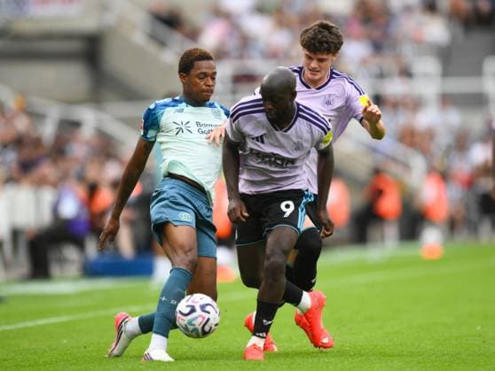 Yoane Wisse of Newcastle United challenges Jeanuel Belocian of Bayer Leverkusen Newcastle United v Bayer Leverkusen, Pre Season Friendly, Football, St James Park, Newcastle, UK - 15 Aug 2026Newcastle St James Park United Kingdom EDITORIAL USE ONLY No use with unauthorised audio, video, data, fixture lists, club league logos or live services. Online in-match use limited to 120 images, no video emulation. No use in betting, games or single club league player publications.  Copyright: xRichardxLee Shutterstockx 17070129az