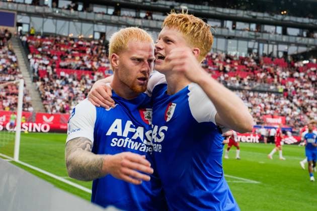 UTRECHT , 15-08-2026, Stadion Galgenwaard , season 2026 2027 , Dutch Eredivisie football , match between FC Utrecht and AZ, Picture shows AZ player Mexx Meerdink and AZ player Kees Smit celebrating the 0-3 Utrecht - AZ  x205744266x Copyright: