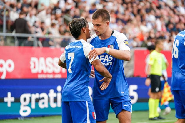 2026-8-15 FC Utrecht v AZ Alkmaar - Dutch Vriendenloterij Eredvisie UTRECHT, NETHERLANDS - AUGUST 15: Weslley Patati of AZ Alkmaar celebrates with teammates after scoring his teams second goal, Wouter Goes of AZ Alkmaar during the Dutch Vriendenloterij Eredvisie match between FC Utrecht and AZ Alkmaar at Stadion Galgenwaard on August 15, 2026 in Utrecht, Netherlands. Utrecht Stadion Galgenwaard Netherlands Content not available for redistribution in The Netherlands directly or indirectly through any third parties. Copyright: xAndrexWeeningx