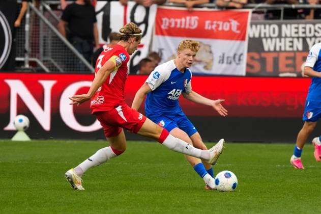 UTRECHT , 15-08-2026, Stadion Galgenwaard , season 2026 2027 , Dutch Eredivisie football , match between FC Utrecht and AZ, Picture shows FC Utrecht player Matisse Didden and AZ player Kees Smit Utrecht - AZ  x205745027x Copyright: