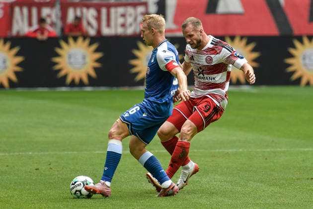 v. li. im Zweikampf Valentin Lässig Laessig (Hoffenheim 6) Eric Hottmann (Duesseldorf 9) 15.08.2026 ¢ Fussball ¢ Fortuna Duesseldorf vs TSG 1899 Hoffenheim II, Merkur Spiel-Arena, Duesseldorf, DFB DFL REGULATIONS PROHIBIT ANY USE OF PHOTOGRAPHS AS IMAGE SEQUENCES AND OR QUASI-VIDE NRW Germany *** From left in a one-on-one situation: Valentin Lässig (Hoffenheim 6), Eric Hottmann (Düsseldorf 9), August 15, 2026 ¢ Soccer ¢ Fortuna Düsseldorf vs. TSG 1899 Hoffenheim II, Merkur Spiel Arena, Düsseldorf, DFB and DFL regulations prohibit any use of photographs as image sequences and or quasi-video. NRW, Germany Copyright: xpepphotox xSaschaxWeizx pep00321, pep_20260815_hm_55164