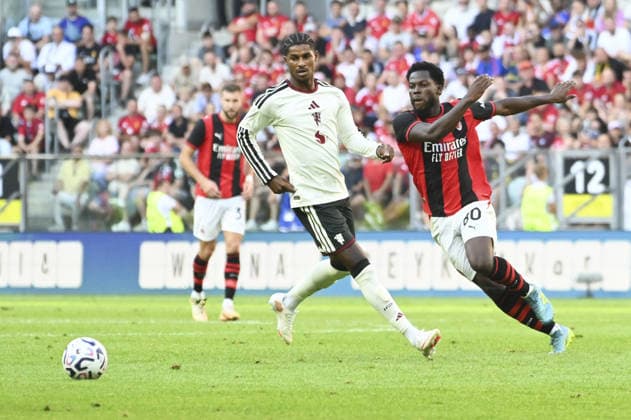 SOCCER - Friendly Match - Manchester United, ManU vs. AC Milan Photo by IPA ABACAPRESS.COM87510781 - Marcus Rasford and Yunus Musah (Milan) during the friendly match between Manchester United and AC Milan at the Arena Tarczynski in Wroclaw, Poland, on August 15, 2026 Wroclaw Poland  Copyright: xIPAxSport ABACAx