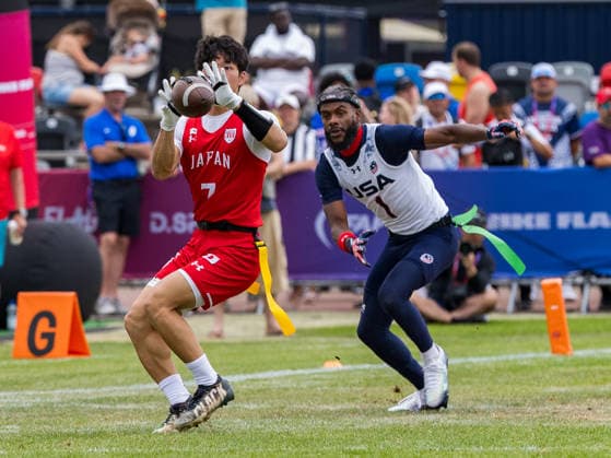 7 HIROKI UCHIDA ( WR DB ) Team Japan Men catch the ball in the air. 1 Antonio Coleman (QB ATH) Team USA Men run to the player. Team Japan Men vs Team USA Men, Flag Football , IFAF, WM, 2026, 13.08-16.08.26, Düsseldorf Flag Football Komplex Düsseldor Germany Copyright: xPFA ChristopherxMettkenx