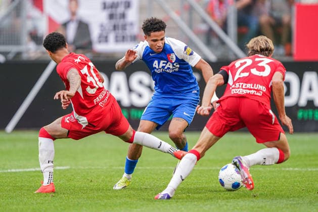 2026-8-15 FC Utrecht v AZ Alkmaar - Dutch Vriendenloterij Eredvisie UTRECHT, NETHERLANDS - AUGUST 15: Ro-Zangelo Daal of AZ Alkmaar battles for possession with Kevin Paredes of FC Utrecht and Niklas Vesterlund of FC Utrecht during the Dutch Vriendenloterij Eredvisie match between FC Utrecht and AZ Alkmaar at Stadion Galgenwaard on August 15, 2026 in Utrecht, Netherlands. Utrecht Stadion Galgenwaard Netherlands Content not available for redistribution in The Netherlands directly or indirectly through any third parties. Copyright: xAndrexWeeningx