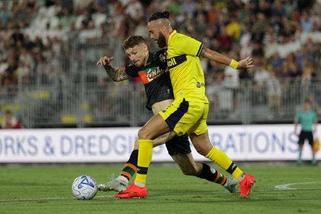 Venezia s Antoine Hainaut in action against Modena s Francesco Zampano during the Frecciarossa Italian Cup 2026 2027 Round of 32 soccer match between Venezia and Modena at Penzo stadium in Venice, Italy - August 15, 2026 - Soccer  Copyright: xMattiaxRadoni LaPressex