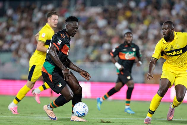 Venezia s Akor Adams in action against Modena s Steven Nador during the Frecciarossa Italian Cup 2026 2027 Round of 32 soccer match between Venezia and Modena at Penzo stadium in Venice, Italy - August 15, 2026 - Soccer  Copyright: xMattiaxRadoni LaPressex