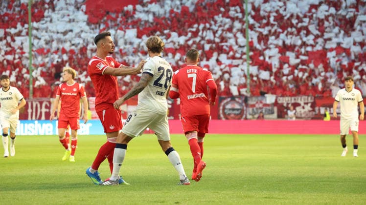 15.08.2026, xrekx, Fussball 2.Bundesliga, 1.FC Kaiserslautern - Karlsruher SC v.l. Mergim Berisha (1.FC Kaiserslautern) Marcel Franke (Karlsruher SC) (DFL DFB REGULATIONS PROHIBIT ANY USE OF PHOTOGRAPHS as IMAGE SEQUENCES and or QUASI-VIDEO) Kaiserslautern *** August 15, 2026, xrekx, Soccer 2. Bundesliga, 1 FC Kaiserslautern vs. Karlsruher SC, Mergim Berisha (1 FC Kaiserslautern), Marcel Franke (Karlsruher SC). DFL and DFB regulations prohibit any use of photographs as image sequences and or quasi-video. Kaiserslautern