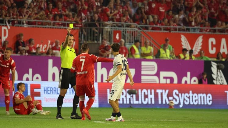 15.08.2026, xrekx, Fussball 2.Bundesliga, 1.FC Kaiserslautern - Karlsruher SC v.l. Schiedsrichter Referee Richard Hempel Marlon Ritter (1.FC Kaiserslautern) Rafael Pinto Pedrosa (Karlsruher SC) eine Gelb Karte erhalten, received a yellow card (DFL DFB REGULATIONS PROHIBIT ANY USE OF PHOTOGRAPHS as IMAGE SEQUENCES and or QUASI-VIDEO) Kaiserslautern *** August 15, 2026, xrekx, Soccer, 2. Bundesliga, 1. FC Kaiserslautern vs. Karlsruher SC; Referee: Richard Hempel; Marlon Ritter (1. FC Kaiserslautern) and Rafael Pinto Pedrosa (Karlsruher SC) received a yellow card, received a yellow card DFL DFB REGULATIONS PROHIBIT ANY USE OF PHOTOGRAPHS as IMAGE SEQUENCES and or QUASI-VIDEO Kaiserslautern