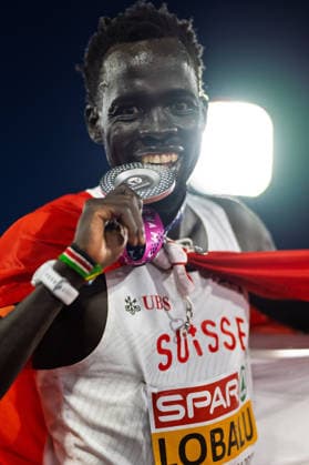 BIRMINGHAM, UNITED KINGDOM - AUGUST 15: Dominic Lokinyomo Lobalu of Switzerland wins the silver Medal in the Men s 10,000m during the European Athletics Championships at Alexander Stadium on August 15, 2026 in Birmingham, United Kingdom. England United Kingdom Copyright: xBEAUTIFULxSPORTS TobiasxLacknerx