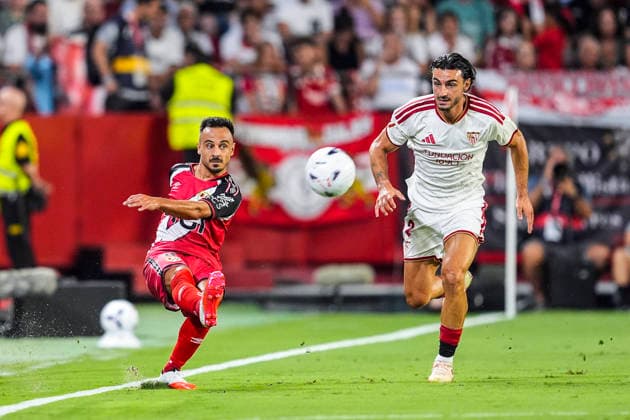 August 15, 2026, Sevilla, Sevilla, Spain: Alvaro Garcia of Rayo Vallecano and Juan Iglesias of Sevilla FC in action during the Spanish league, LaLiga EA Sports, football match played between Sevilla FC and Rayo Vallecano at Ramon Sanchez-Pizjuan stadium on August 15, 2026, in Sevilla, Spain. Sevilla FC V Rayo Vallecano - LaLiga EA Sports  - ZUMAa181 20260815_zaa_a181_063 Copyright: xJoaquinxCorcherox