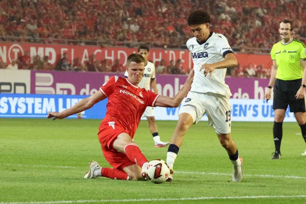 15.08.2026, xrekx, Fussball 2.Bundesliga, 1.FC Kaiserslautern - Karlsruher SC v.l. Fabian Kunze (1.FC Kaiserslautern) Louey Ben Farhat (Karlsruher SC) Zweikampf, Aktion, action, battle for the ball (DFL DFB REGULATIONS PROHIBIT ANY USE OF PHOTOGRAPHS as IMAGE SEQUENCES and or QUASI-VIDEO) Kaiserslautern *** August 15, 2026, xrekx, Soccer 2. Bundesliga, 1. FC Kaiserslautern vs. Karlsruher SC – Fabian Kunze (1. FC Kaiserslautern) vs. Louey Ben Farhat (Karlsruher SC) – Tackle, Action, battle for the ball. DFL and DFB regulations prohibit any use of photographs as image sequences and or quasi-video. Kaiserslautern