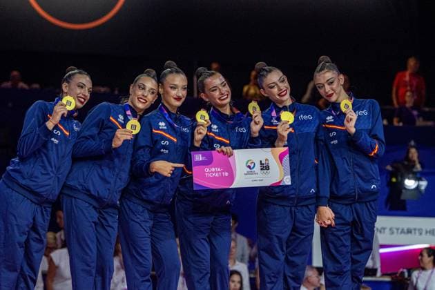 August 15, 2026, Frankfurt, Hesse, Germany: Spain team members, including INES BERGUA NAVALES, ANDREA CORRAL, MARINA CORTELLES, ANDREA FERNANDEZ, LUCIA MUNOZ, and SALMA SOLAUN, show off their gold medals and Olympic qualification after winning the 42nd Rhythmic gymnastics, Rhythmische Sportgymnastik, RSG World Championships group all-around finals in the Festhalle in Frankfurt, Hesse, Germany on Saturday, August 15, 2026. 2026 Rhythmic Gymnastics World Championships Group All-Around Finals  - ZUMAd168 20260815_zsp_d168_013 Copyright: xKaixDambachx
