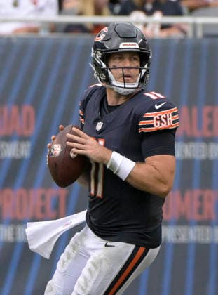Chicago Bears quarterback Case Keenum (11) looks for an open receiver in the third quarter against the Cleveland Browns during a preseason game at Soldier Field in Chicago on Saturday, August 15, 2026.  CHI20260815123 MARKxBLACK