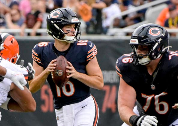 Chicago Bears quarterback Miller Moss (16) looks for an open receiver against the Cleveland Browns during the during a preseason game at Soldier Field in Chicago on Saturday, August 15, 2026. The Bears defeated the Brown 34-10.  CHI20260815126 MARKxBLACK