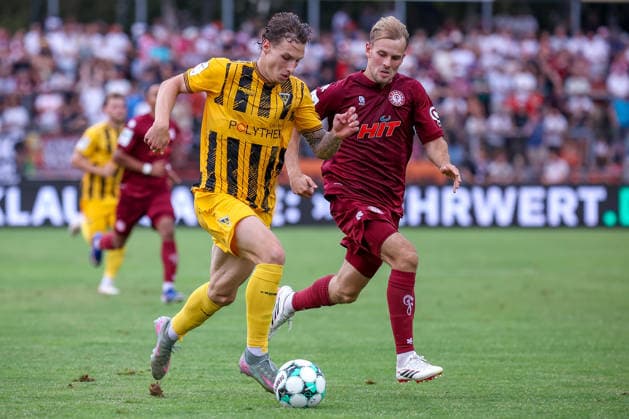 15.08.2026, xsefx, Fußball, SC Fortuna Köln - TSV Alemannia Aachen, 3.Liga, Südstation, 2. Spieltag, Saison 2026 2027: Georg Strauch (Fortuna Koeln 11) im Zweikampf gegen Daniel Starodid (Alemannia Aachen 09) DFB regulations prohibit any use of photographs as image sequences and or quasi-video. Nordrhein-Westfalen Deutschland *** August 15, 2026, xsefx, Soccer, SC Fortuna Köln vs. TSV Alemannia Aachen, 3rd Division, Südstation, Matchday 2, 2026–2027 Season: Georg Strauch of Fortuna Cologne 11 in a tackle against Daniel Starodid of Alemannia Aachen 09. DFB regulations prohibit any use of photographs as image sequences and or quasi-video. North Rhine-Westphalia, Germany