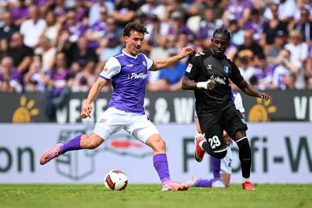 2. Bundesliga 26 27 - VfL Osnabrück - 1. FC Magdeburg am 15.08.2026 an der Bremer Brücke in Osnabrück Münst Leonhard (Osnabrueck) im Zweikampf gegen Richmond Tachie (Magdeburg) *** 2. Bundesliga, Matchday 26, VfL Osnabrück 1, FC Magdeburg on August 15, 2026, at Bremer Brücke in Osnabrück; Leonhard Münst of Osnabrück in a tackle against Richmond Tachie of Magdeburg MT