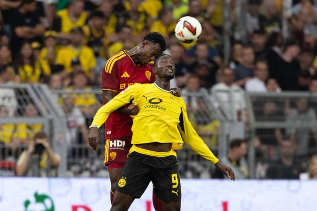 (260816) -- DORTMUND, Aug. 16, 2026 -- Serhou Guirassy (front) of Borussia Dortmund and Evan Ndicka of Roma head for the ball during a friendly football match between Borussia Dortmund of Germany and Roma of Italy in Dortmund, Germany, Aug. 15, 2026. (Photo by Xinhua) (SP)GERMANY-DORTMUND-FOOTBALL-FRIENDLY-DORTMUND VS ROMA JoachimxBywaletz 