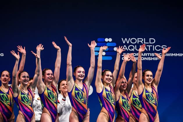 (260816) -- BUDAPEST, Aug. 16, 2026 -- Members of Team Belarus react after the Team Acrobatic Final of the World Aquatics Junior Artistic Swimming Championships in Budapest, Hungary, on Aug. 15, 2026. (Photo by Xinhua) (SP)HUNGARY-BUDAPEST-ARTISTIC SWIMMING-WORLD JUNIOR CHAMPIONSHIPS-TEAM ACROBATIC DavidxBalogh 
