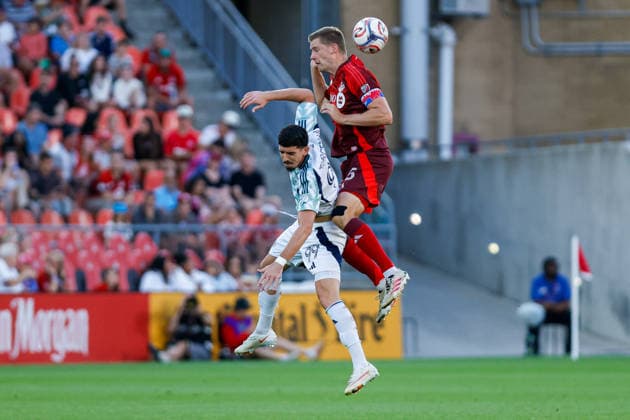 Toronto FC v New England Revolution Walker Zimmerman 25 of Toronto FC (R) competes for the ball against Dor Turgeman 99 of New England Revolution (L) during a Major League Soccer game between Toronto FC and New England Revolution at BMO Field in Toronto, Ontario, Canada, on August 15, 2026. Toronto Ontario Canada  Copyright: xIndrawanxKumalax originalFilename:kumala-majorlea260815_np0TH.jpg
