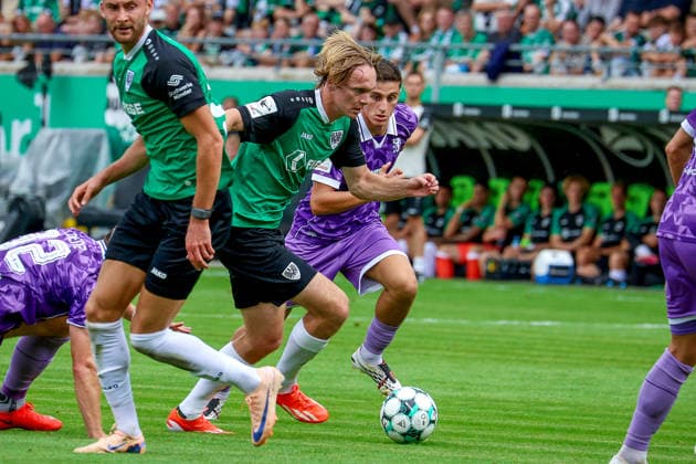 15.08.2026, xsscx, Fußball 3. Liga, Preußen Münster - FC Ingolstadt 04, 2. Spieltag, LVM-Preußenstadion, Saison 2026 2027: Ryan Johansson (SC Preußen Münster 20) im Zweikampf gegen Emre Gül (FC Ingolstadt 5) DFB regulations prohibit any use of photographs as image sequences and or quasi-video. Nordrhein-Westfalen Deutschland *** August 15, 2026, xsscx, Soccer 3rd Division, Preußen Münster vs. FC Ingolstadt 04, Matchday 2, LVM Preußenstadion, 2026–2027 Season: Ryan Johansson of SC Preußen Münster 20 in a tackle against Emre Gül of FC Ingolstadt 5. DFB regulations prohibit any use of photographs as image sequences and or quasi-video. North Rhine-Westphalia, Germany