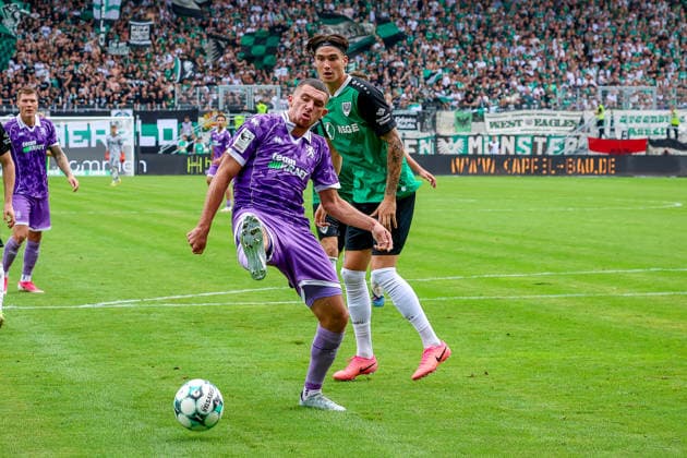 15.08.2026, xsscx, Fußball 3. Liga, Preußen Münster - FC Ingolstadt 04, 2. Spieltag, LVM-Preußenstadion, Saison 2026 2027: Ognjen Drakulic (FC Ingolstadt 30) im Zweikampf gegen Marvin Schulz (SC Preußen Münster 10) DFB regulations prohibit any use of photographs as image sequences and or quasi-video. Nordrhein-Westfalen Deutschland *** August 15, 2026, xsscx, Soccer 3rd Division, Preußen Münster vs. FC Ingolstadt 04, Matchday 2, LVM Preußenstadion, 2026–2027 Season: Ognjen Drakulic (FC Ingolstadt 30) in a tackle against Marvin Schulz (SC Preußen Münster 10). DFB regulations prohibit any use of photographs as image sequences and or quasi-video. North Rhine-Westphalia, Germany